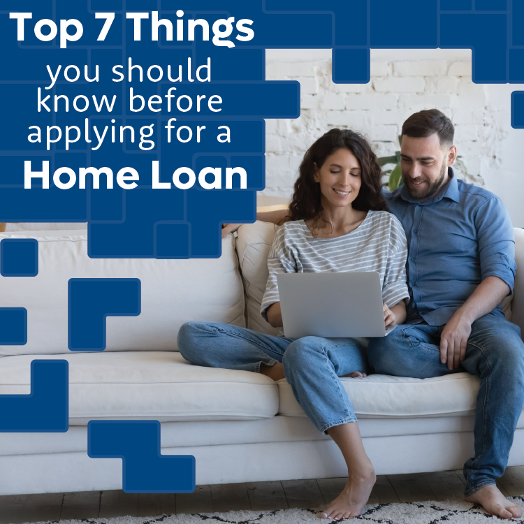 Couple on sofa using laptop, smiling. Text: "Top 7 Things you should know before applying for a Home Loan." Cozy setting, blue accents.