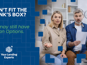 Concerned couple on a sofa with laptop and papers, in a bright room, beside text: Don’t fit the bank’s box? Loan options.